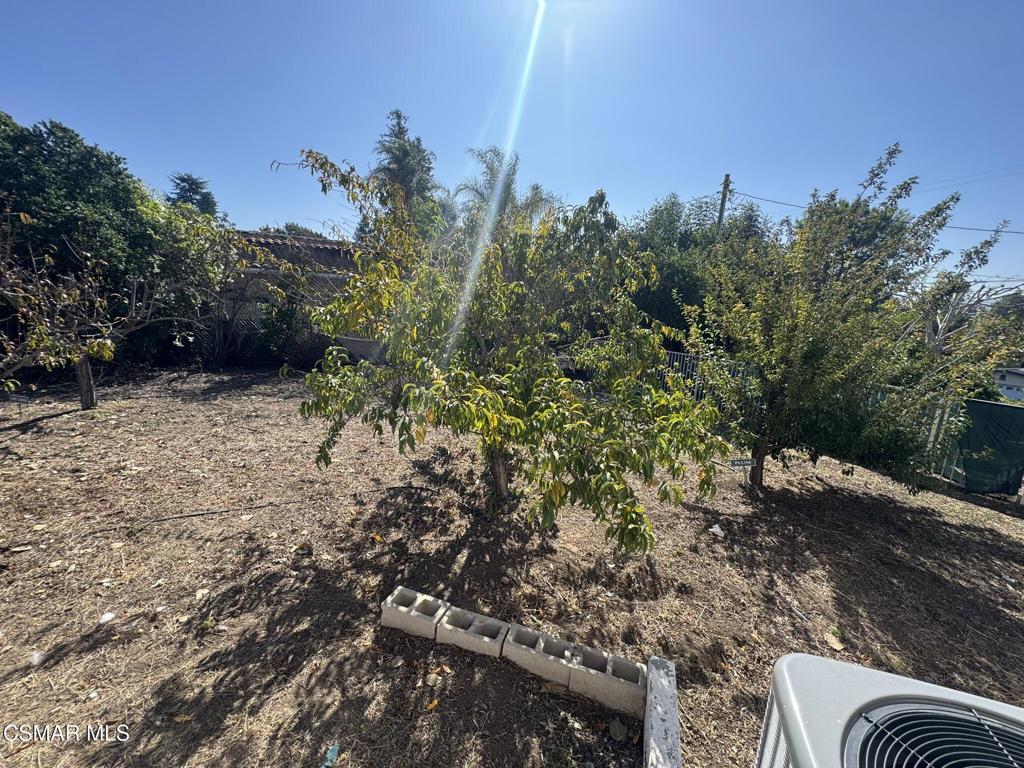 381 Laguna Terrace Simi Valley, CA 93065 - Photo 46 of 48 a backyard of a house with lots of green space