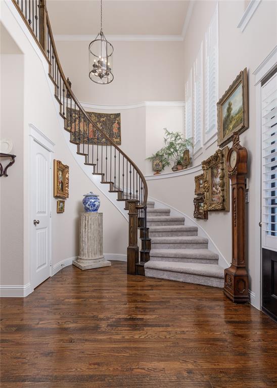 2500 Addison Street McKinney, TX 75071 - Photo 5 of 33 Entrance foyer spiral staircase.