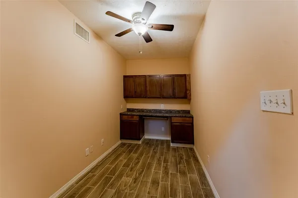 a view of kitchen with microwave and stove