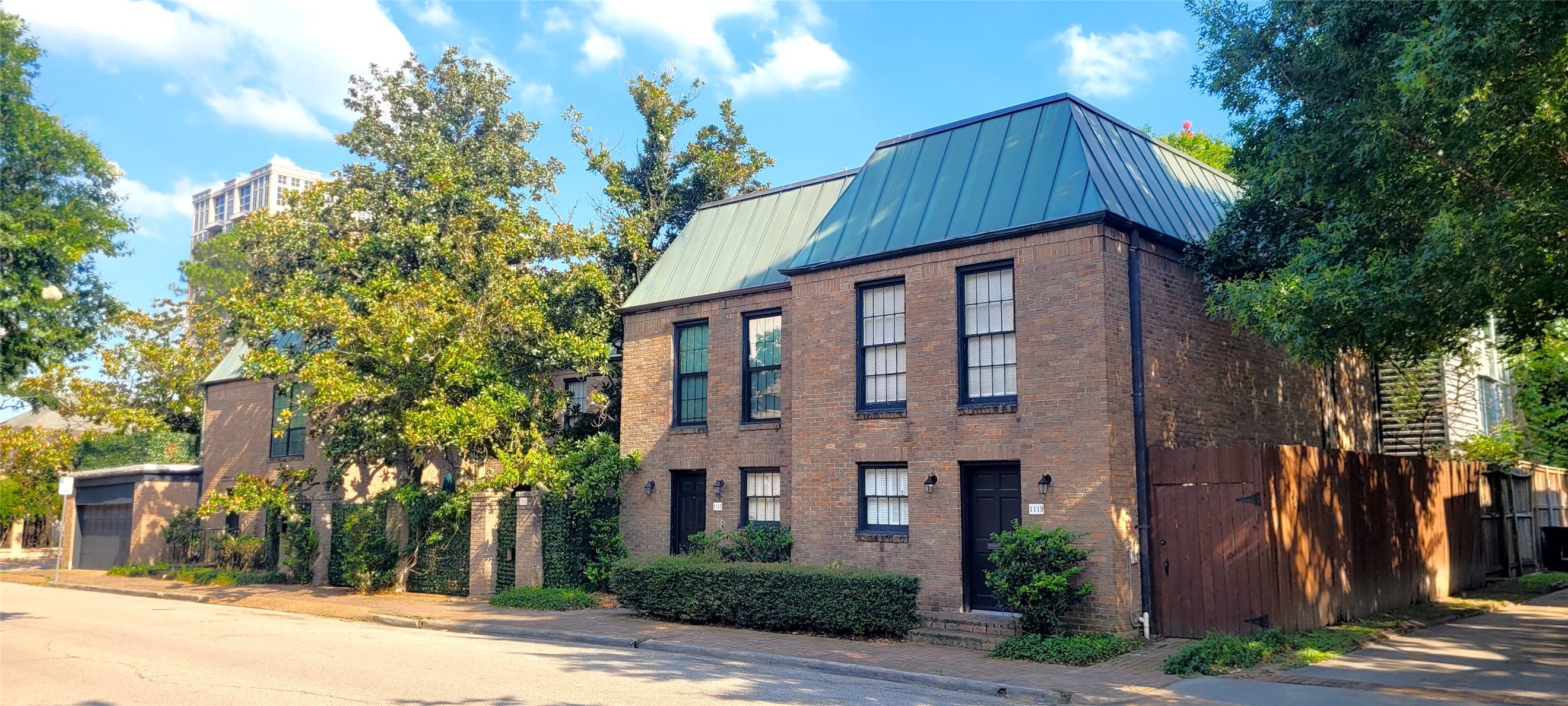 1111 Autrey Street, Unit 5 Houston, TX 77006 - Photo 2 of 33 a front view of a house with a yard and tree s