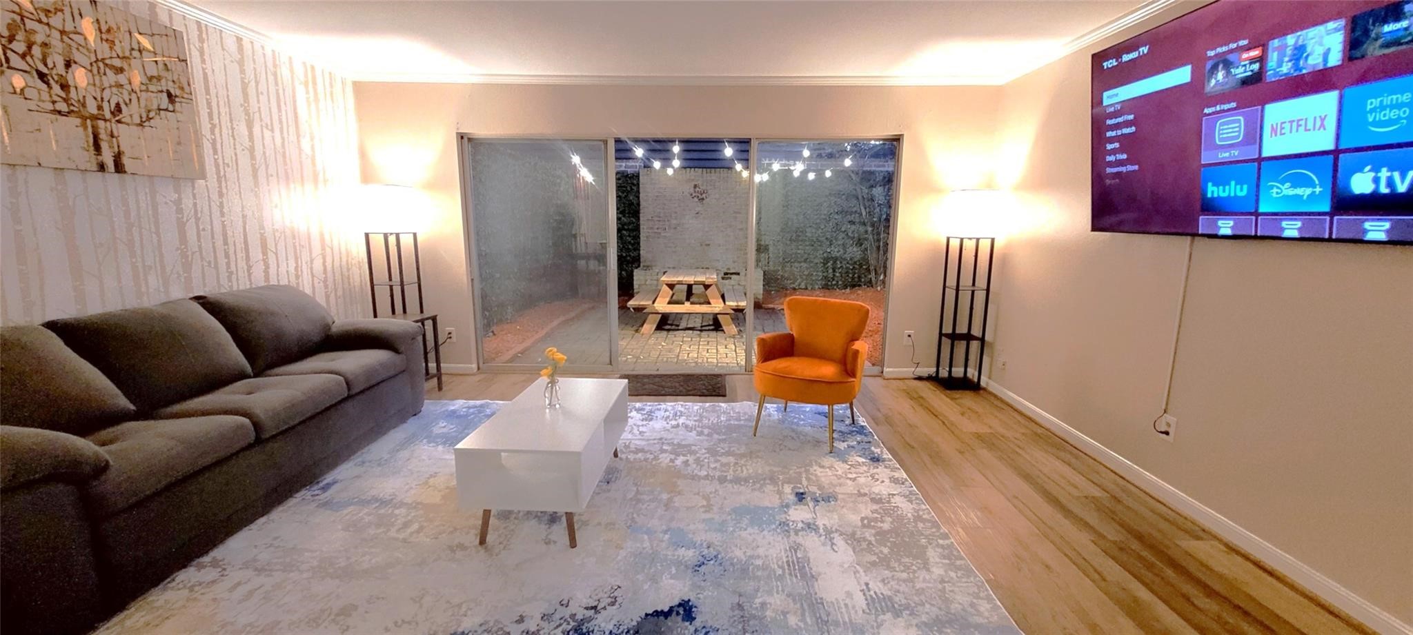 1111 Autrey Street, Unit 5 Houston, TX 77006 - Photo 5 of 33 a living room with furniture and a large window