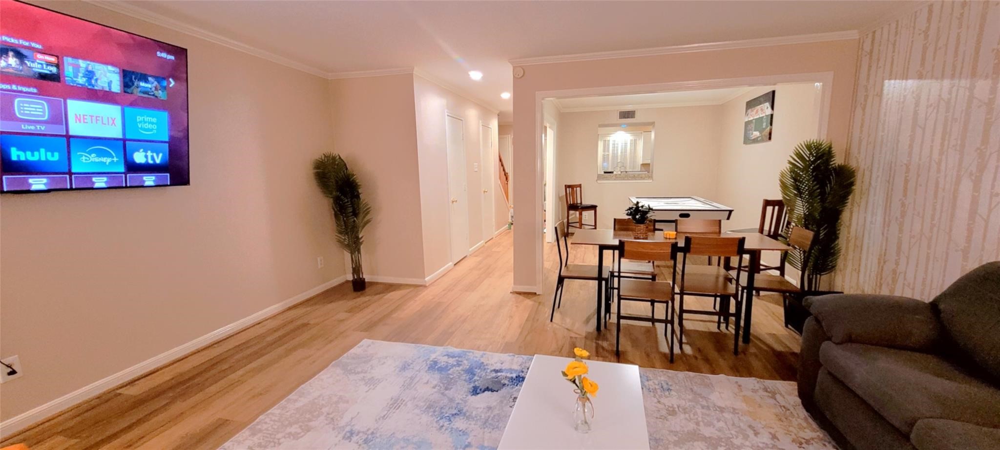 1111 Autrey Street, Unit 5 Houston, TX 77006 - Photo 7 of 33 a dining room with furniture and wooden floor