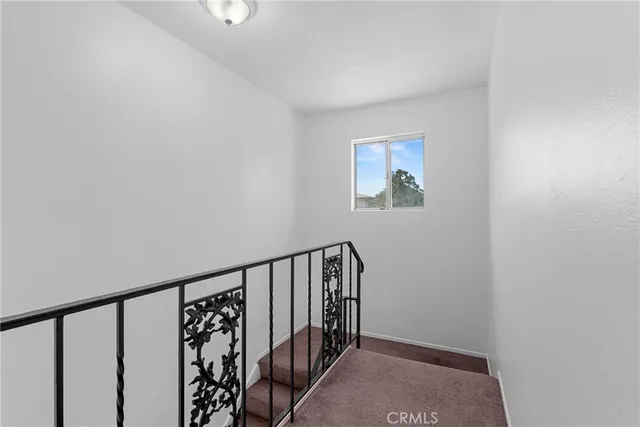 a view of hallway with stairs