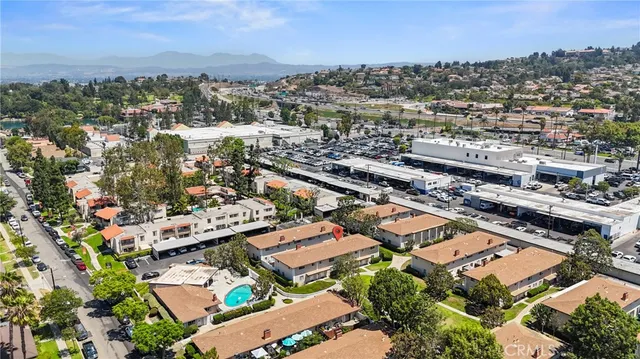 an aerial view of a city with lots of residential buildings