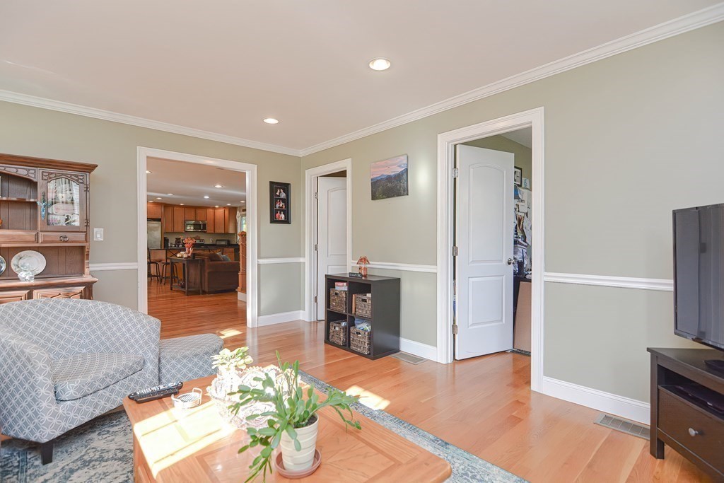 115 Bruce Road Walpole, MA 02081 - Photo 20 of 42 a living room with furniture and a wooden floor
