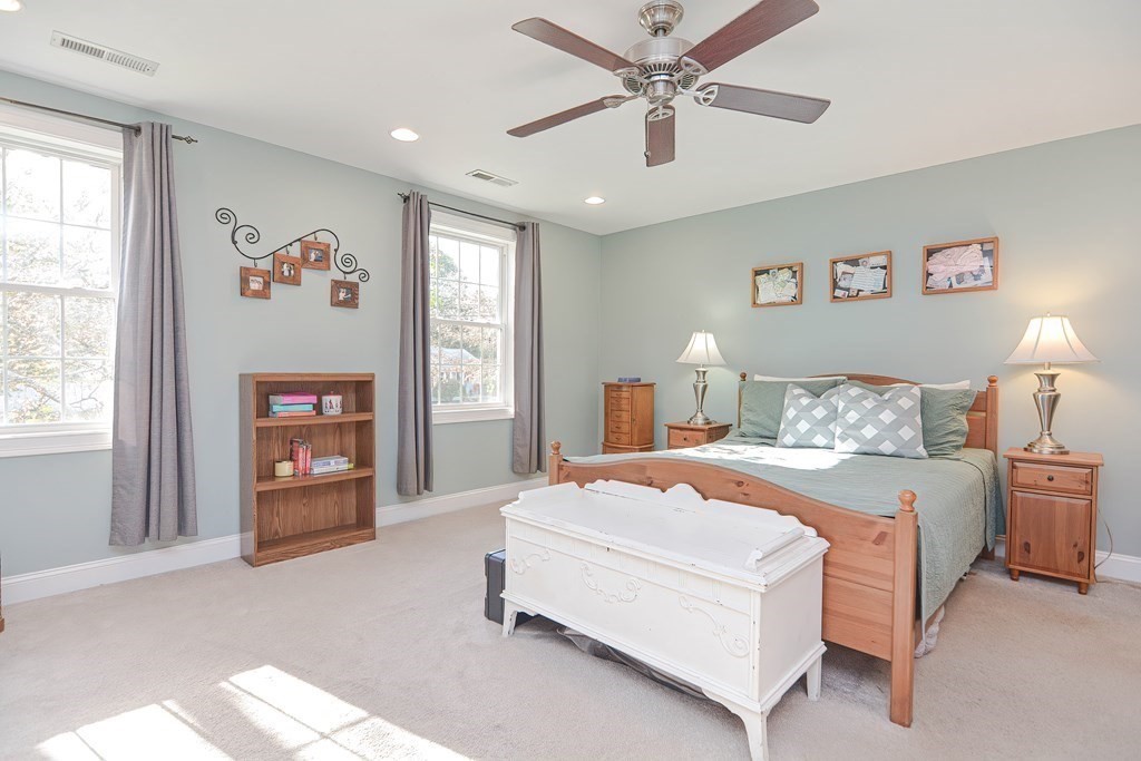 115 Bruce Road Walpole, MA 02081 - Photo 22 of 42 a bedroom with a bed and a large cabinets