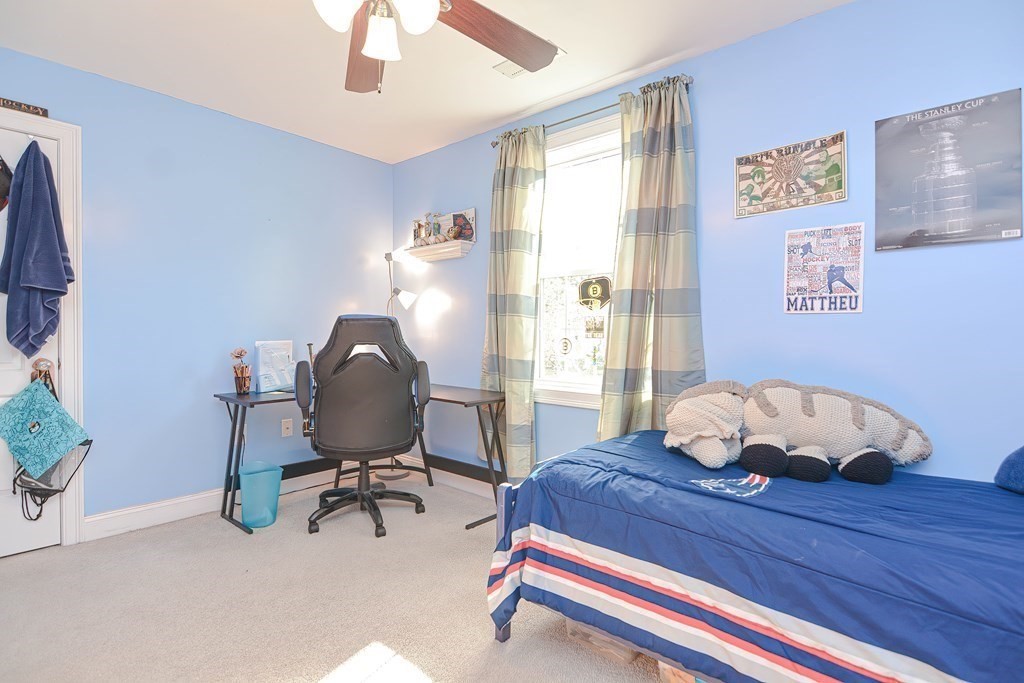 115 Bruce Road Walpole, MA 02081 - Photo 29 of 42 a workspace with furniture and a window