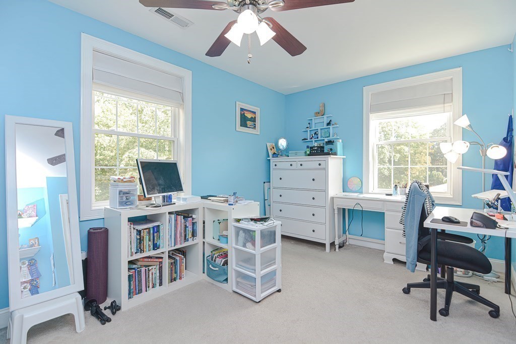 115 Bruce Road Walpole, MA 02081 - Photo 32 of 42 a view of a workspace with furniture and a window