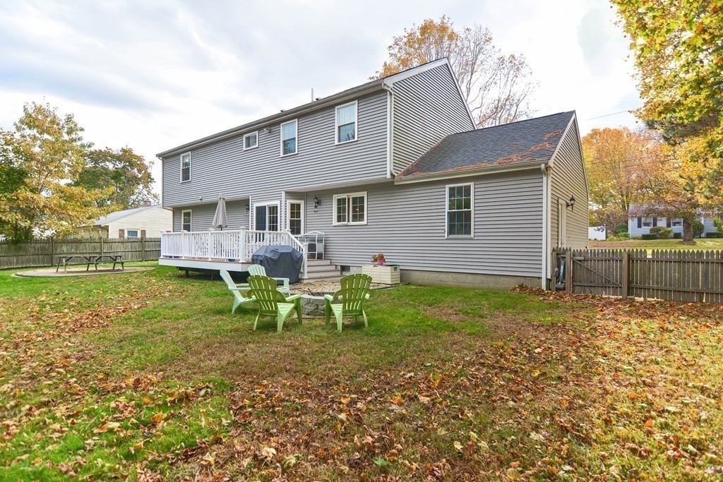 115 Bruce Road Walpole, MA 02081 - Photo 38 of 42 a view of house with a backyard