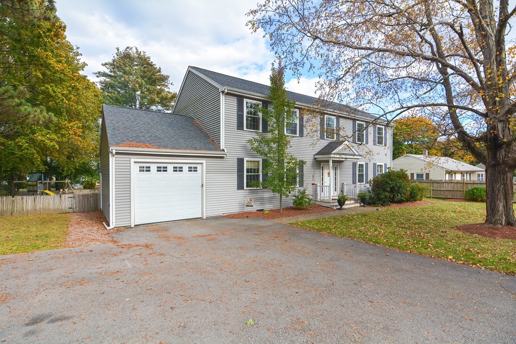 115 Bruce Road Walpole, MA 02081 - Photo 4 of 42 a view of a house with a yard and large tree