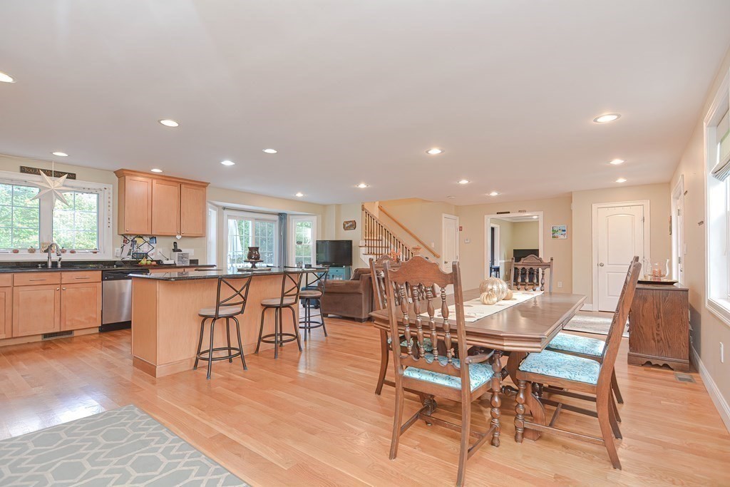 115 Bruce Road Walpole, MA 02081 - Photo 9 of 42 a view of a dining area with furniture and kitchen view