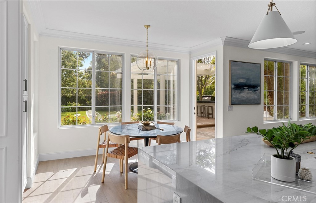 16 Meryton Irvine, CA 92603 - Photo 12 of 54 a dining room with furniture window and outdoor view