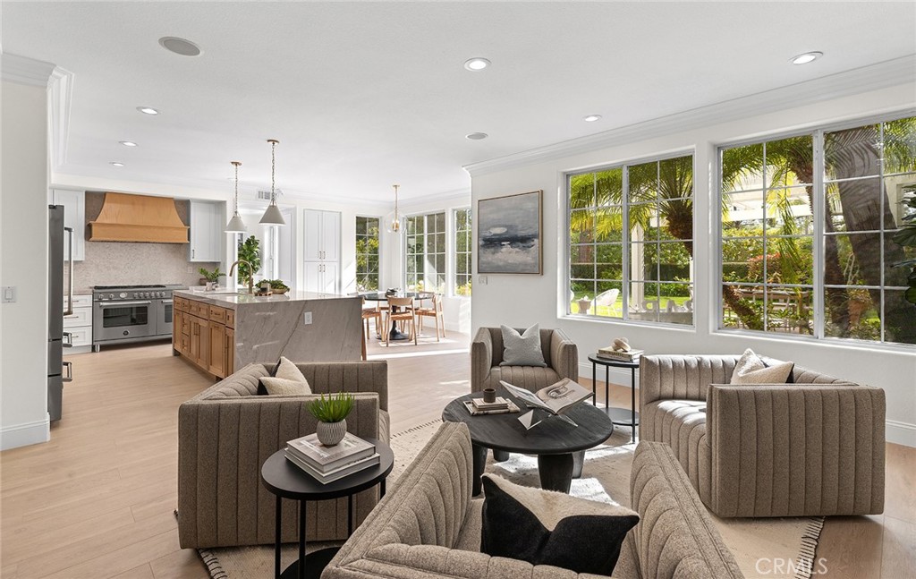 16 Meryton Irvine, CA 92603 - Photo 17 of 54 a living room with furniture and a large window