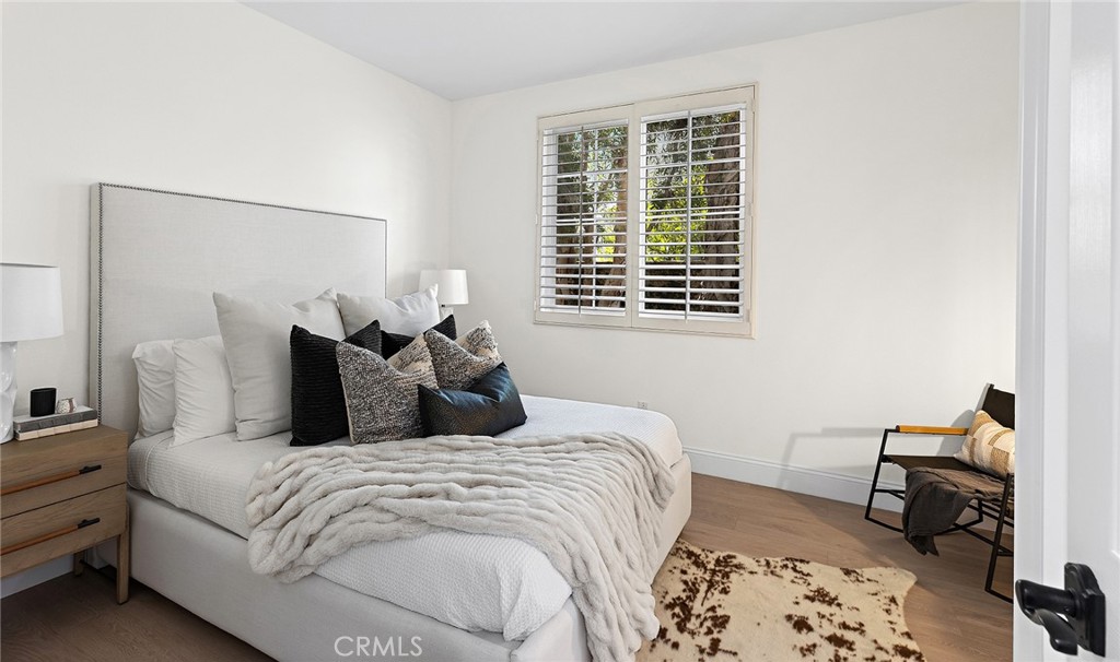 16 Meryton Irvine, CA 92603 - Photo 19 of 54 a bedroom with a bed and a window