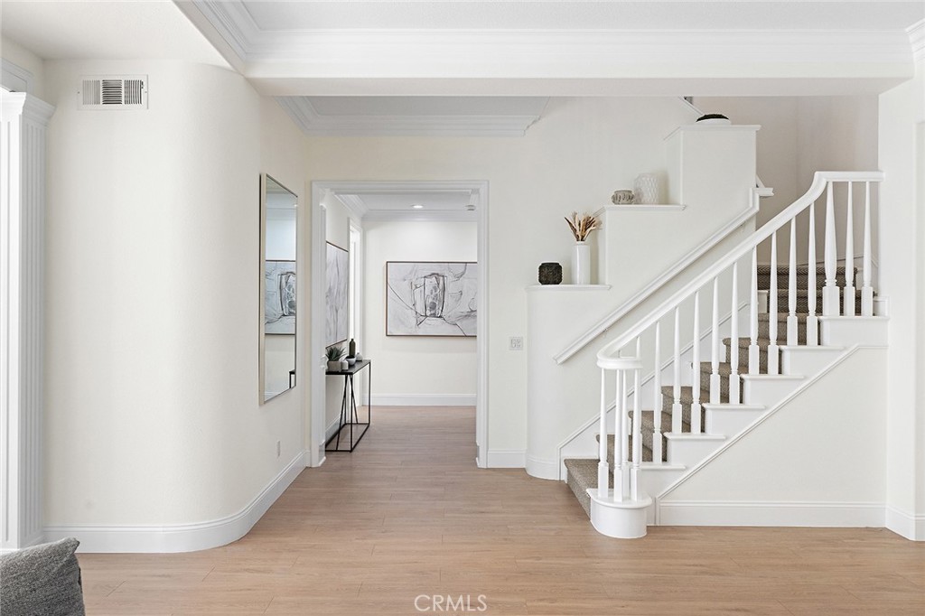 16 Meryton Irvine, CA 92603 - Photo 24 of 54 a view of an entryway with wooden floor