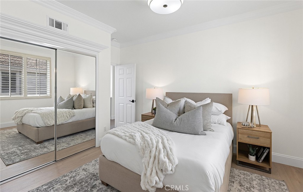 16 Meryton Irvine, CA 92603 - Photo 40 of 54 a bedroom with a bed and a couch