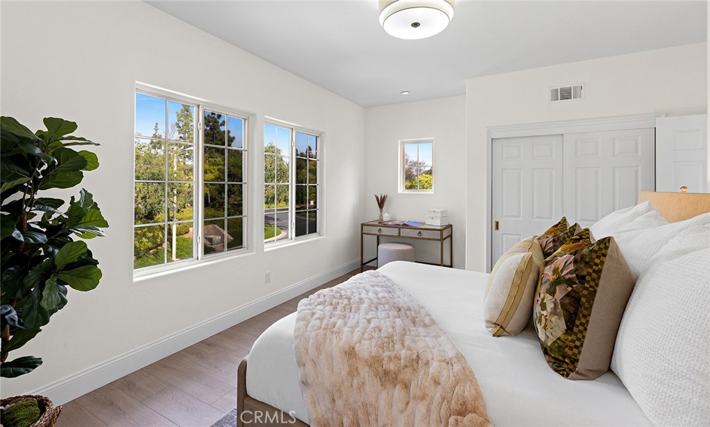 16 Meryton Irvine, CA 92603 - Photo 42 of 54 a bed sitting in a bedroom next to a window