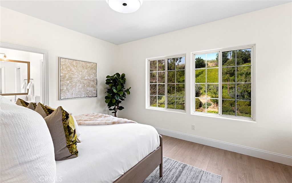 16 Meryton Irvine, CA 92603 - Photo 43 of 54 a bedroom with a bed and a window