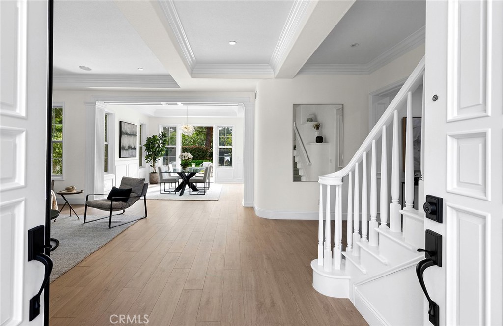 16 Meryton Irvine, CA 92603 - Photo 5 of 54 a view of a livingroom with furniture and hardwood floor