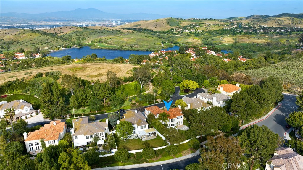 16 Meryton Irvine, CA 92603 - Photo 52 of 54 an aerial view of a houses with a yard