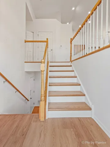 a view of entryway with wooden floor