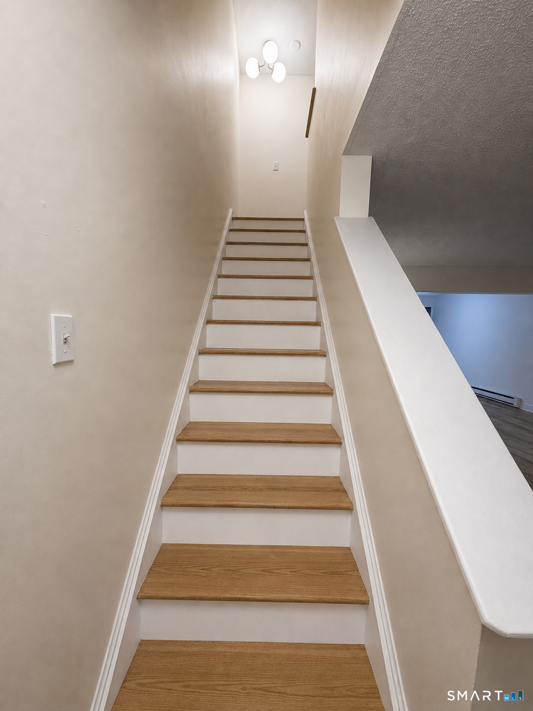 745 Merrow Road, Unit 139 Coventry, CT 06238 - Photo 9 of 20 stairwell leading to upper level
