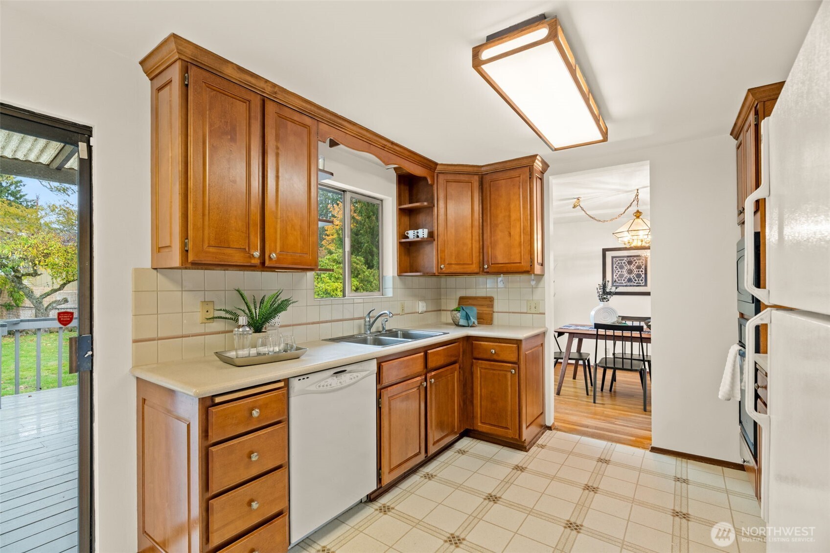 22039 98th Place West Edmonds, WA 98020 - Photo 13 of 32 a kitchen with a sink cabinets and window