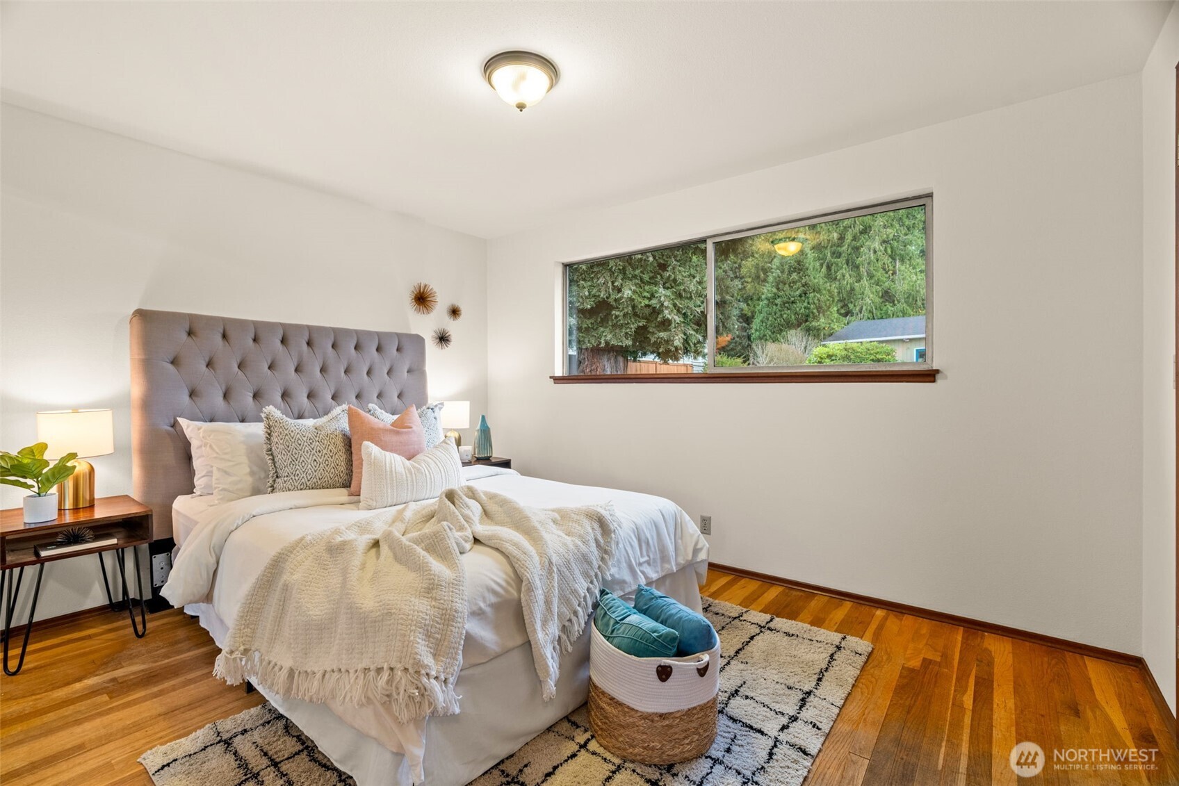22039 98th Place West Edmonds, WA 98020 - Photo 15 of 32 a bedroom with a bed and a window