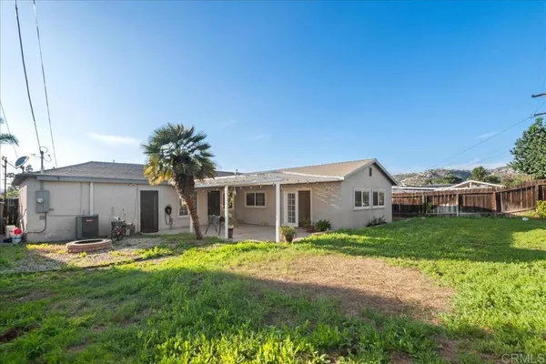 a house view with a garden space