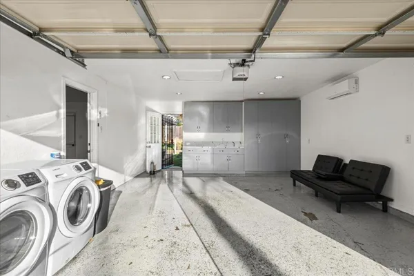 a living room with furniture and a couch