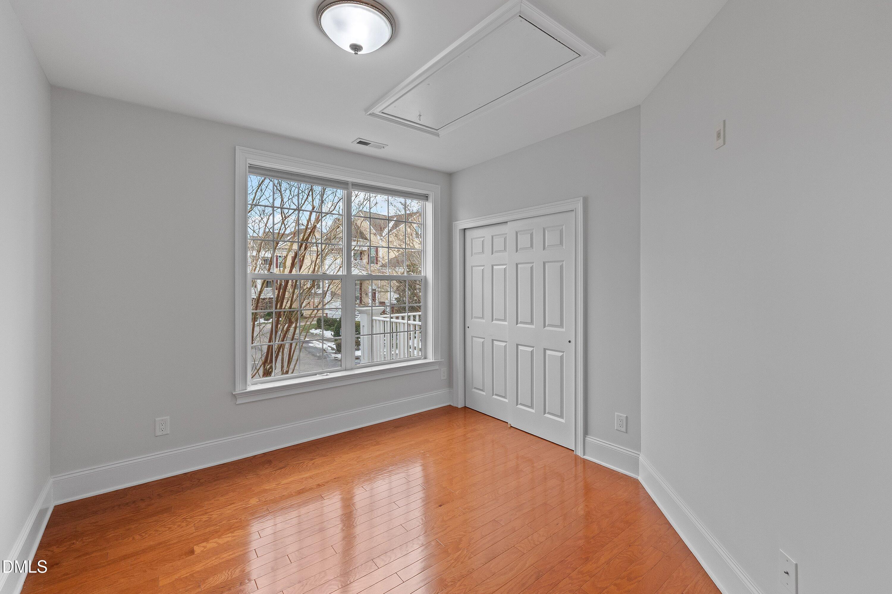 9211 Calabria Drive, Unit 205 Raleigh, NC 27617 - Photo 31 of 55 an empty room with a window