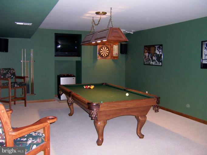 5957 Sandy Ridge Elkridge, MD 21075 - Photo 23 of 30 a room with pool tables and windows