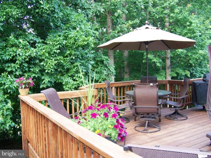 5957 Sandy Ridge Elkridge, MD 21075 - Photo 27 of 30 a view of a patio with furniture