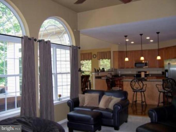 5957 Sandy Ridge Elkridge, MD 21075 - Photo 10 of 30 a living room with furniture and a large window