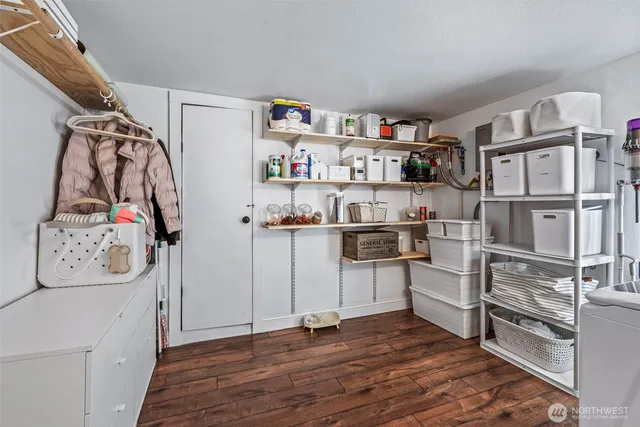 a bathroom with a sink a mirror and a shower