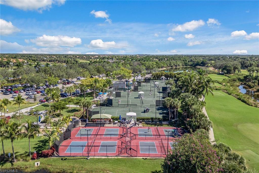 2703 Aviamar Circle Naples, FL 34114 - Photo 47 of 49 a view of a city with lots of residential buildings ocean and mountain view in back