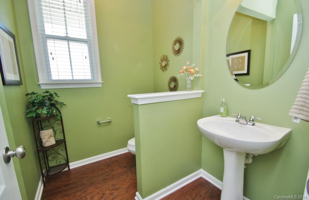1301 Ridgehaven Road Waxhaw, NC 28173 - Photo 6 of 24 a bathroom with a sink and a mirror