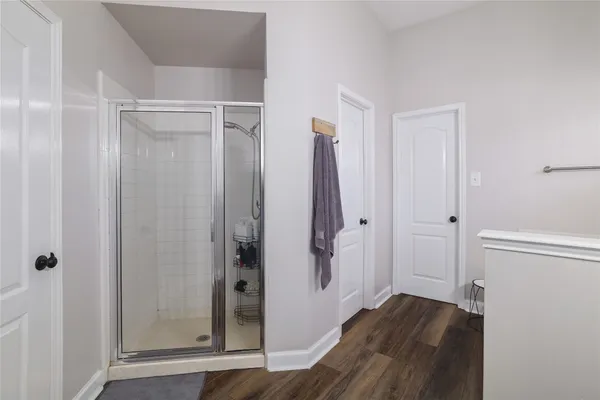 a view of entryway with wooden floor