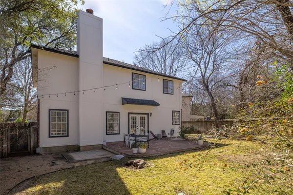 a view of a house with swimming pool