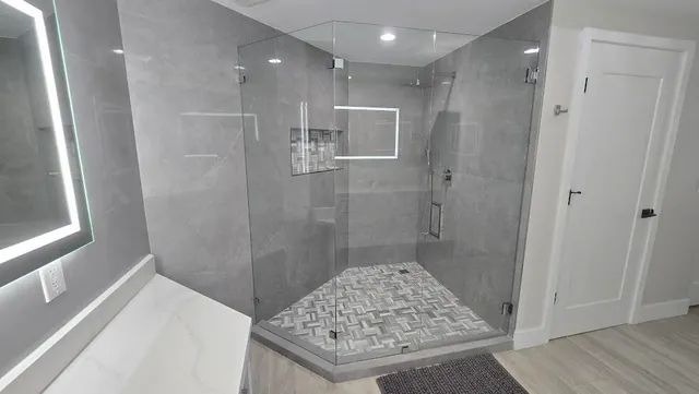 a bathroom with a sink and a shower