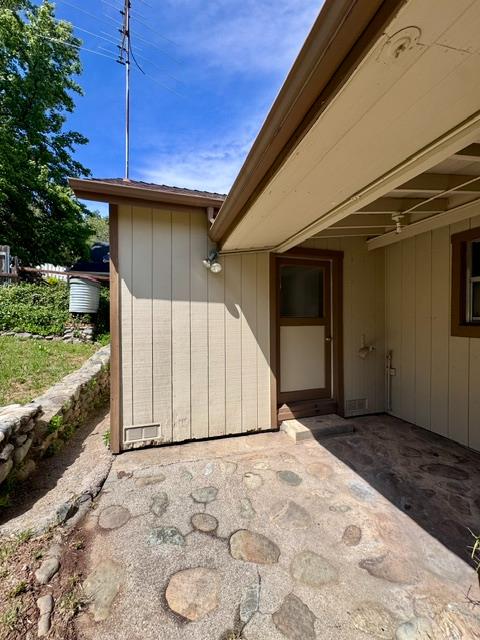 240 Pleasant Street Colfax, CA 95713 - Photo 24 of 26 a view of backyard with garage and entertaining space