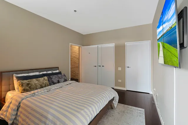 a large living room with stainless steel appliances granite countertop a couch and a view of living room