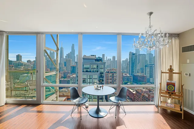 a kitchen area with granite countertop a sink and a stove