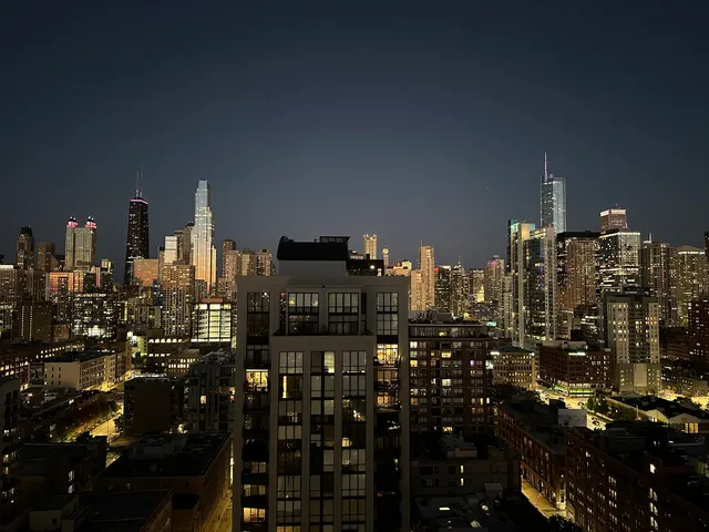 a view of a balcony with city view