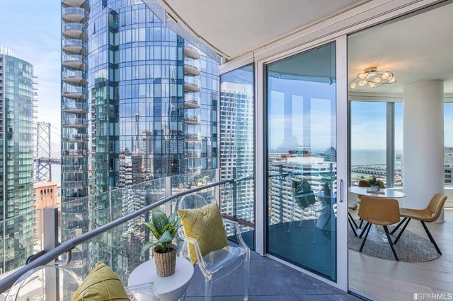 a view of a city with tall buildings