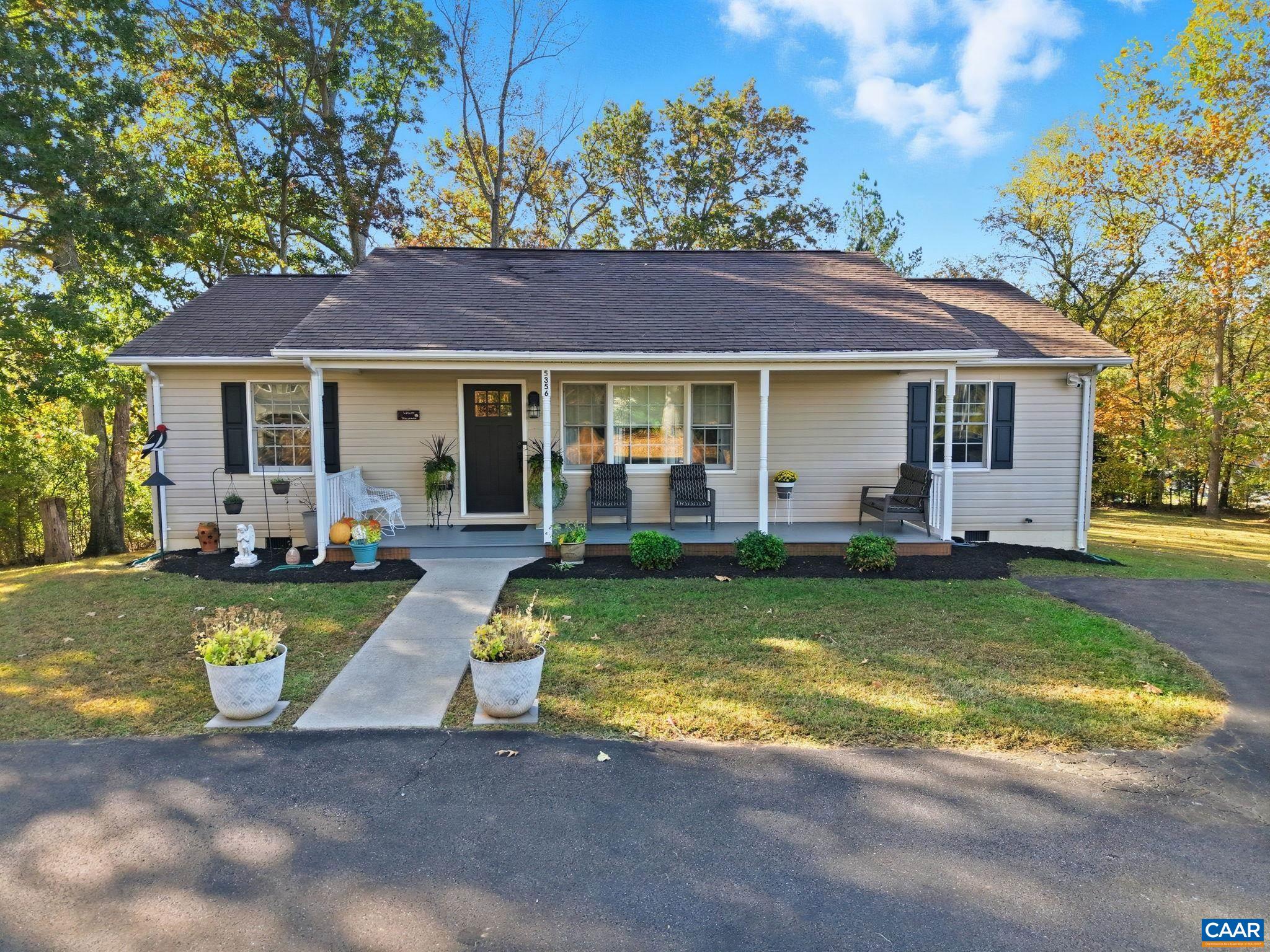 5356 Amicus Road Ruckersville, VA 22968 - Photo 1 of 46 a view of a house with swimming pool and a yard