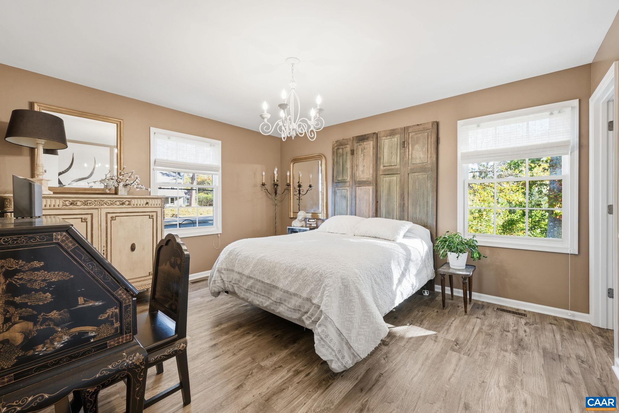 5356 Amicus Road Ruckersville, VA 22968 - Photo 12 of 46 a bedroom with a bed and a table
