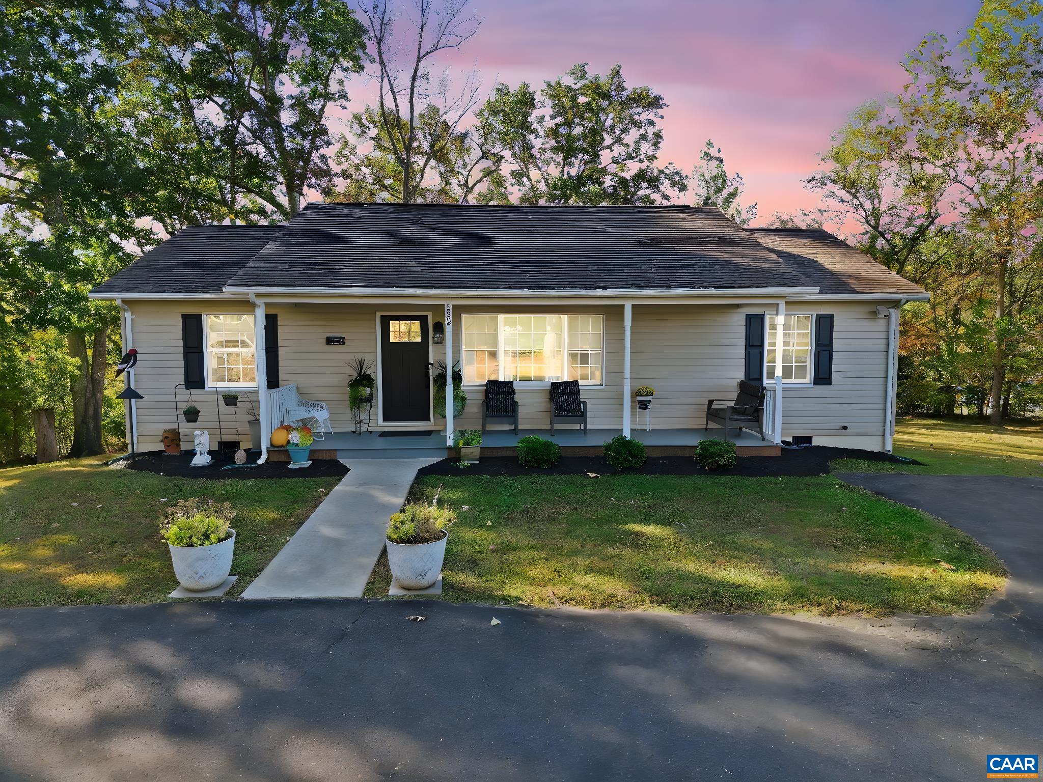 5356 Amicus Road Ruckersville, VA 22968 - Photo 2 of 46 a view of a house with backyard porch and sitting area