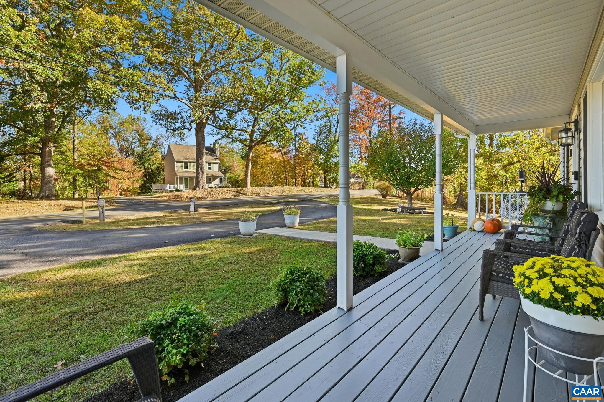 5356 Amicus Road Ruckersville, VA 22968 - Photo 3 of 46 a view of a two chairs in the balcony