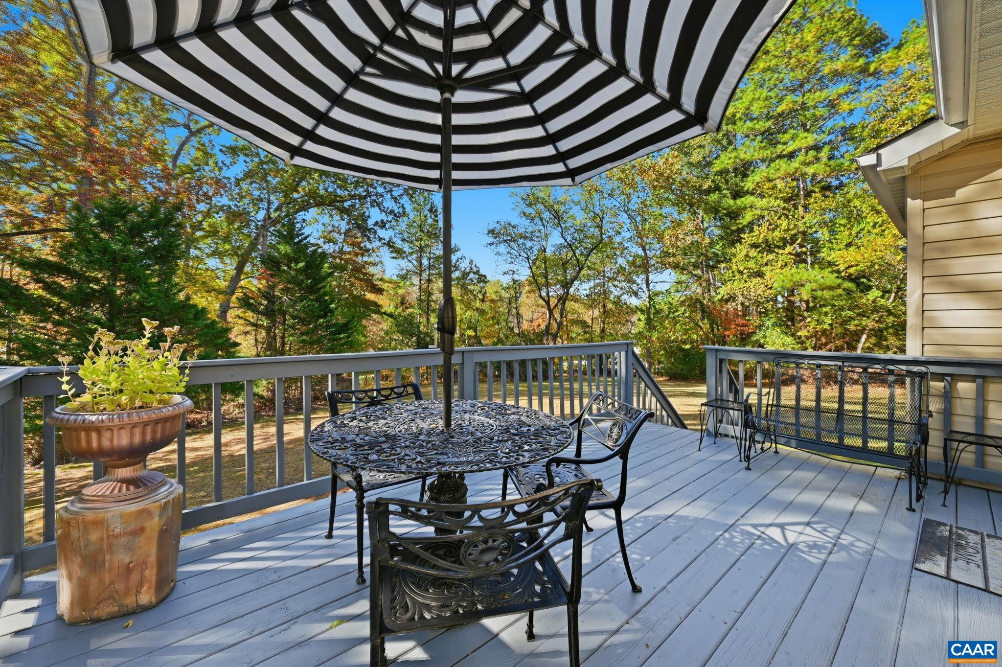 5356 Amicus Road Ruckersville, VA 22968 - Photo 31 of 46 a view of a chairs and table in the balcony